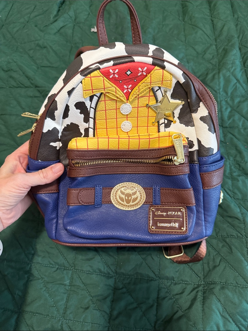 Loungefly Disney Pixar Woody Mini Backpack in Blue, Brown, Yellow